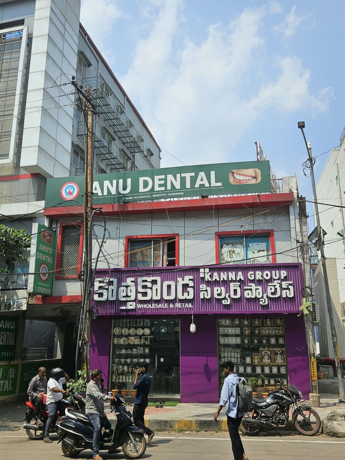 Street front of Anu Dental on RTC X Roads, Chikkadpally, with the green Anu Dental sign